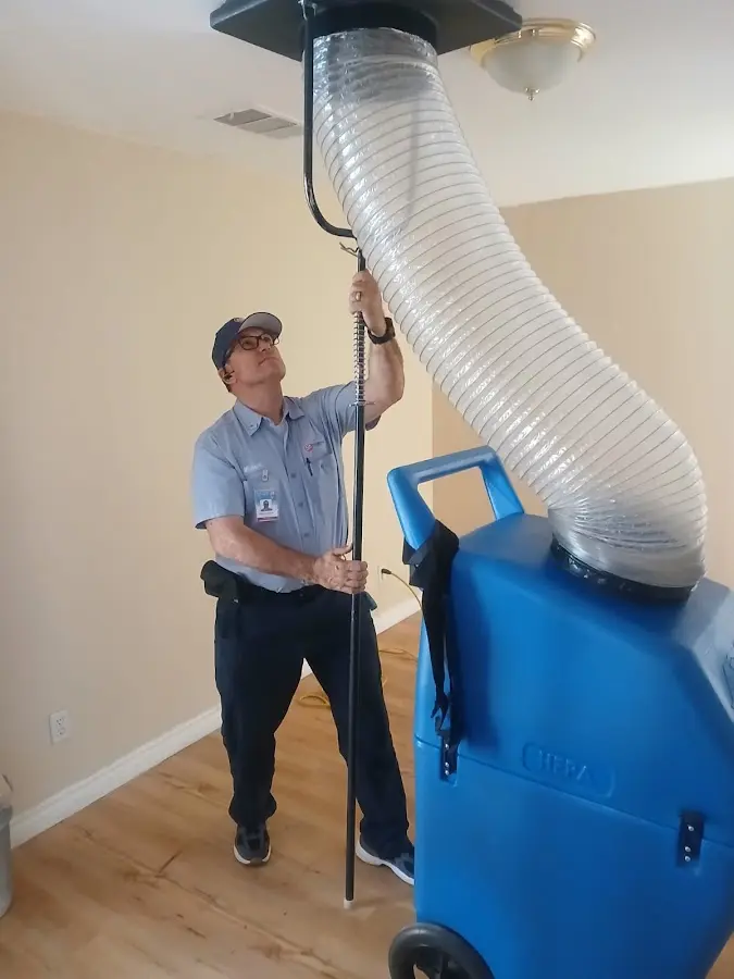 Mini Split Installation technician using HEPA equipment in West Vero Corridor